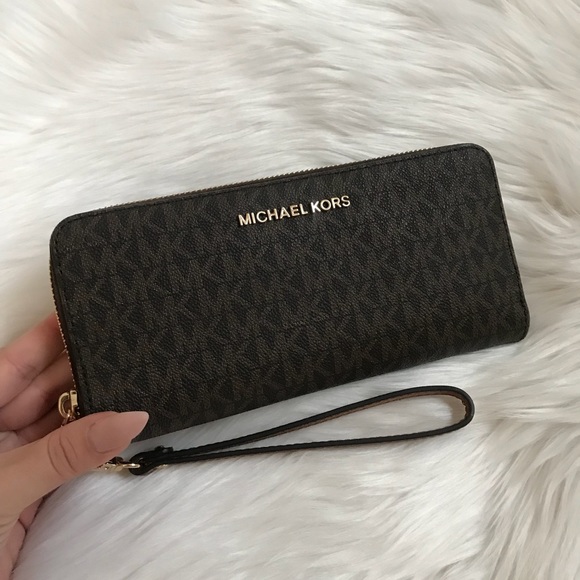 Michael Kors | Bags | Michael Kors Jet Set Travel Brown Logo Wallet ...